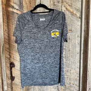 Under Armor Semi fitted XL heat gear women’s rounded neck Wyoming logo shirt